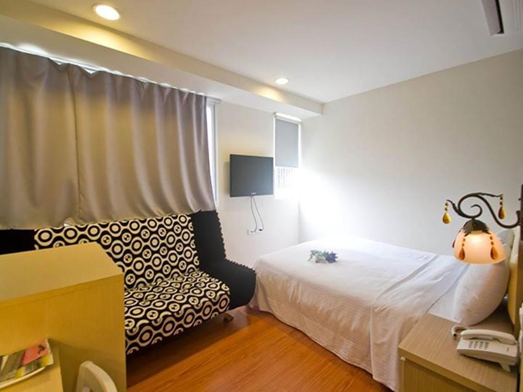 Green Park Commercial Hotel Tajnan Szoba fotó